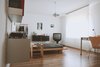 The underground guest room includes multiple 606 shelving systems, Braun TV3 set and this beautiful beech Vitsoe RZ 57 work table from 1957. Photo 5 of Philipp's Appartment modern home
