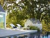 Modern home with Outdoor, Back Yard, Trees, Swimming Pools, Tubs, Shower, Shrubs, Concrete Patio, Porch, Deck, Infinity Pools, Tubs, Shower, and Hardscapes. landscape, pool Photo 6 of The Birdhouse