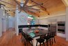 Kitchen with exposed beams and oak ceiling Photo 14 of Higgins Lake House modern home