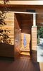 Outdoor shower with cedar clad door to blend with siding Photo 12 of Higgins Lake House modern home