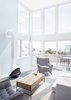 Modern home with Living Room, Chair, Sofa, Light Hardwood Floor, Coffee Tables, Wood Burning Fireplace, and Rug Floor. Living room Photo 11 of Sea Bright House