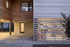 Modern home with Outdoor, Front Yard, and Walkways. Entryway and screened gear enclosure at dusk Photo 5 of Sea Bright House