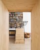 Modern home with Staircase, Wood Tread, and Metal Railing. Plywood organizing "spine" threshold between living space and studio space Photo 8 of Wells Fargo Loft