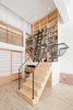 Modern home with Office, Library, Craft Room, Study, Storage, Shelves, and Light Hardwood Floor. Stair leading to loft bedroom and library Photo 10 of Wells Fargo Loft