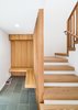 Modern home with Staircase, Wood Tread, and Wood Railing. Entry bench and stair Photo 4 of Deertrack Lane