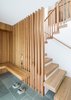 Modern home with Staircase, Wood Tread, and Wood Railing. Entry bench, screen and stair Photo 3 of Deertrack Lane