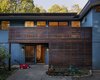 Modern home with Exterior, House Building Type, Wood Siding Material, Shed RoofLine, and Gable RoofLine. Covered entry screen and porch Photo 5 of Deertrack Lane