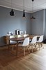 Modern home with Dining Room, Chair, Medium Hardwood Floor, Lamps, Table, and Ceiling Lighting. Dining room Photo 2 of The Bosio's house