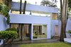 Elevation from graden. Salvaged tree Photo 8 of Casa Lila modern home