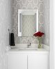 Modern home with Bath Room, Marble Counter, Porcelain Tile Floor, Undermount Sink, Wall Lighting, and One Piece Toilet. Powder Room Photo 9 of Harlem Renaissance