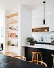Modern home with Kitchen, Engineered Quartz Counter, Wood Cabinet, Medium Hardwood Floor, Subway Tile Backsplashe, Pendant Lighting, Range, and Range Hood. Kitchen Photo 3 of Tilt-Shift House
