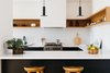 Modern home with Kitchen, Engineered Quartz Counter, Wood Cabinet, Subway Tile Backsplashe, Pendant Lighting, Range, and Undermount Sink. Kitchen Photo 4 of Tilt-Shift House