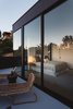 Modern home with Exterior, Concrete Siding Material, and House Building Type. Master Bedroom Deck Photo 9 of Tilt-Shift House