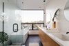 Modern home with Bath Room, Porcelain Tile Floor, Engineered Quartz Counter, Undermount Sink, and Freestanding Tub. Master Bathroom Photo 11 of Tilt-Shift House