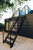 Modern home with Exterior, Concrete Siding Material, and House Building Type. Roof Deck Stair Photo 13 of Tilt-Shift House