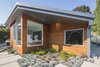 Modern home with Exterior, House Building Type, Wood Siding Material, and Butterfly RoofLine. Exterior Front Photo 4 of View House