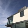 Modern home with Exterior, House Building Type, Concrete Siding Material, Flat RoofLine, Metal Roof Material, and Stucco Siding Material. Exterior Photo 20 of SL House