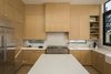 Modern home with Kitchen, Vessel Sink, Range, Ceramic Tile Backsplashe, Wood Cabinet, Engineered Quartz Counter, Medium Hardwood Floor, and Refrigerator. Kitchen Photo 13 of SL House