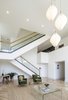 Modern home with Living Room, Chair, Pendant Lighting, Ceiling Lighting, Coffee Tables, and Medium Hardwood Floor. Living Room Photo 4 of Echo House
