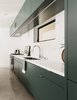Modern home with Kitchen, Ceramic Tile Backsplashe, Refrigerator, Cooktops, Concrete Floor, Undermount Sink, Engineered Quartz Counter, Range, Colorful Cabinet, and Recessed Lighting. Kitchen Photo 9 of Echo House