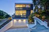 Modern home with Exterior, Stucco Siding Material, Metal Siding Material, House Building Type, and Flat RoofLine. Exterior Front Photo of Echo House