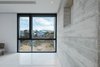 Modern home with Dining Room, Travertine Floor, and Pendant Lighting. perspective towards the east.... Photo 17 of CK House