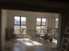 Modern home with Living Room, Bench, Ceiling Lighting, and Light Hardwood Floor. Open up Living area Photo 6 of Ritz Rest