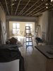Modern home with Living Room, Coffee Tables, Ceiling Lighting, and Wood Burning Fireplace. Progress Photo 2 of Ritz Rest