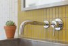 Wall mounted faucets add yet another space saving element to the bathrooms. Photo 16 of Details Make the Difference in this San Francisco Urban Loft modern home