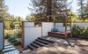 Just outside of the master bedroom and bath, this enclosed terrace provides privacy and a place for relaxation. By Arterra Landscape Architects Photo 5 of Talk of the Neighborhood modern home