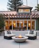 The generous outdoor living area has room for dining and relaxation. By Arterra Landscape Architects Photo 2 of Talk of the Neighborhood modern home