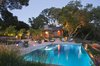 The landscape is illuminated in the evenings, providing an ethereal quality and extending the use and enjoyment of the gardens.
By Arterra Landscape Architects. Photo by Michele Lee Willson Photo 2 of Homestead on Whiskey Hill modern home
