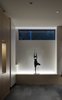 Modern home with Living Room, Accent Lighting, Wall Lighting, Porcelain Tile Floor, and Floor Lighting. Living Room sculpture plinth: Bronze Sculpture by Gail Folwell Photo 2 of the Duncan Residence