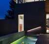 Modern home with Outdoor, Tile Patio, Porch, Deck, Small Pools, Tubs, Shower, Back Yard, Hardscapes, Landscape Lighting, and Flowers. Koi pond at West Patio Photo 9 of the Duncan Residence