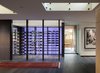 Modern home with Living Room, Accent Lighting, and Porcelain Tile Floor. Living Room wine display Photo 3 of the Duncan Residence