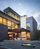 Modern home with Outdoor, Back Yard, Trees, Raised Planters, Walkways, Small Pools, Tubs, Shower, Large Patio, Porch, Deck, Tile Patio, Porch, Deck, and Landscape Lighting. View of West Patio Photo 12 of the Duncan Residence