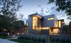 Modern home with Outdoor, Trees, Side Yard, Front Yard, Walkways, Hardscapes, Raised Planters, Small Patio, Porch, Deck, Decking Patio, Porch, Deck, Tile Patio, Porch, Deck, Metal Fences, Wall, Horizontal Fences, Wall, and Landscape Lighting. View from the Street, from Southeast Photo 11 of the Duncan Residence