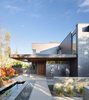 Modern home with Outdoor, Front Yard, Shrubs, Trees, Small Pools, Tubs, Shower, Horizontal Fences, Wall, Landscape Lighting, Metal Fences, Wall, and Small Patio, Porch, Deck. Front Porch: Bronze sculpture by Gail Folwell Photo 14 of the Duncan Residence