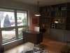 Modern home with Office, Study Room Type, Chair, Desk, Bookcase, Shelves, Lamps, and Light Hardwood Floor. Office Photo 6 of Disco 3332 in Dallas, TX
