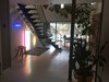 Modern home with Staircase, Wood Tread, and Metal Railing. Atrium Photo 7 of Disco 3332 in Dallas, TX