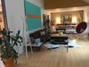 Modern home with Living Room, Chair, Sofa, End Tables, Floor Lighting, Accent Lighting, Wall Lighting, and Light Hardwood Floor. Formal Living Photo 9 of Disco 3332 in Dallas, TX