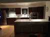 Modern home with Kitchen, Engineered Quartz Counter, Wood Cabinet, Light Hardwood Floor, Ceramic Tile Backsplashe, Recessed Lighting, Wall Oven, Refrigerator, Range Hood, Microwave, Drop In Sink, Cooktops, and Dishwasher. Kitchen Photo 12 of Disco 3332 in Dallas, TX