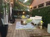 Modern home with Outdoor, Grass, Trees, Lap Pools, Tubs, Shower, Back Yard, Large Patio, Porch, Deck, Wood Patio, Porch, Deck, Pavers Patio, Porch, Deck, Wood Fences, Wall, Landscape Lighting, and Hanging Lighting. Deck at Disco 3332 Photo 19 of Disco 3332 in Dallas, TX