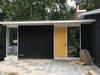 Modern home with Exterior, Mid-Century Building Type, and Wood Siding Material. Front exterior view. We used charred cypress from Nakamoto Forestry. Photo 10 of Hollin Hills 2017 Renovation