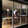Modern home with Dining Room and Ceiling Lighting. living room/kitchen seen from the front. The Aalto dining table was inherited from the previous owner of the house and has been refinished using invisible finish. Photo 7 of Hollin Hills 2017 Renovation
