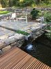 Modern home with Outdoor, Small Patio, Porch, Deck, Trees, Shrubs, Large Patio, Porch, Deck, Grass, Decking Patio, Porch, Deck, Wood Patio, Porch, Deck, Back Yard, and Stone Patio, Porch, Deck. Water channel and pond Photo 11 of Architect's own Home