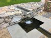 Modern home with Outdoor, Hardscapes, Grass, Back Yard, Small Patio, Porch, Deck, and Stone Patio, Porch, Deck. Fountain Photo 12 of Architect's own Home