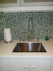 The deep stainless steel sink is by Kraus. Faucet and soap dispensers by Danze. Photo 7 of Modern Laundry, Pantry and Dog Room modern home