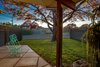 Modern home with Outdoor, Side Yard, Trees, Hardscapes, Grass, Decomposed Granite Patio, Porch, Deck, Small Patio, Porch, Deck, Vertical Fences, Wall, Metal Fences, Wall, and Stone Fences, Wall. South courtyard after Photo 18 of 1963 Post and Beam Mid Century Modern