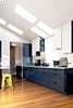 Window & skylight become the same. Similarly, the grey oak cascades down from the ceiling to the upper cabinets & east wall.
Photos by: Black Olive Photographic Photo 6 of SMITH Kitchen modern home